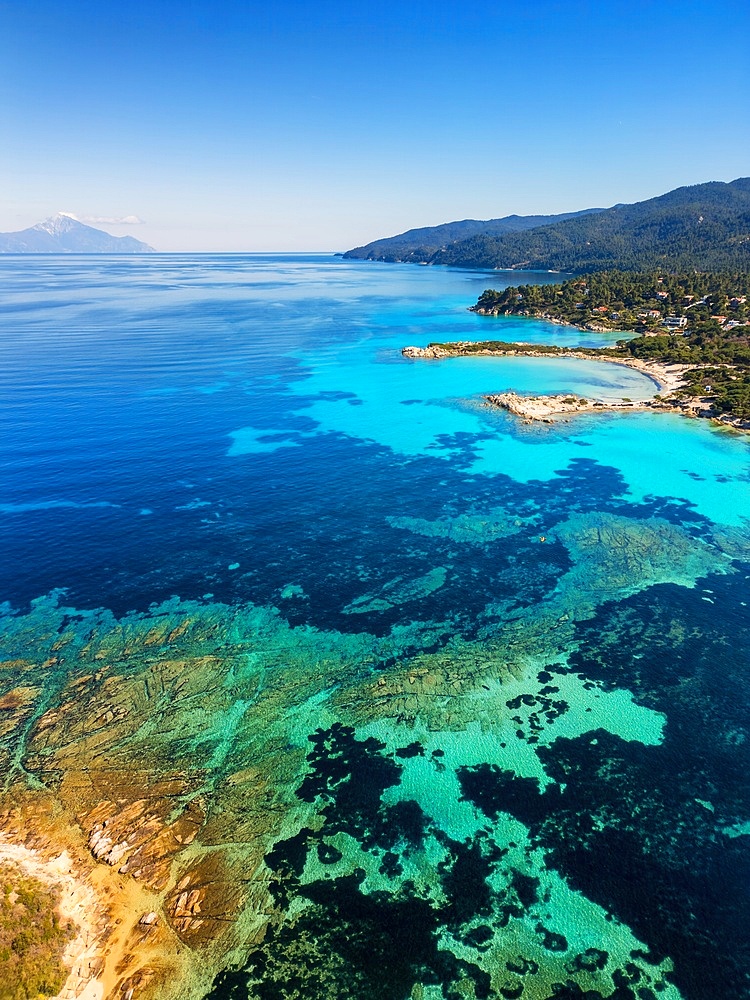 Karydi beach with turquoise water drone aerial view, in Greece