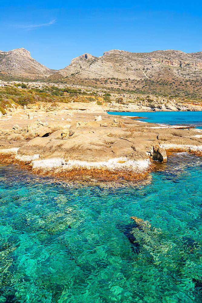 Petrified forest Agia Marina Agios Nikolaos Geopark beach with turquoise water in the south of Greece