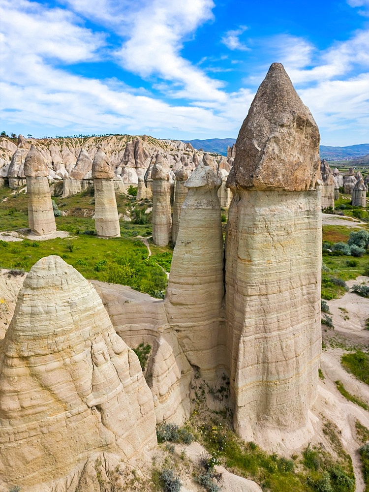 Drone aerial view of Love valley with beautiful rock formations in Cappadocia, Turkey