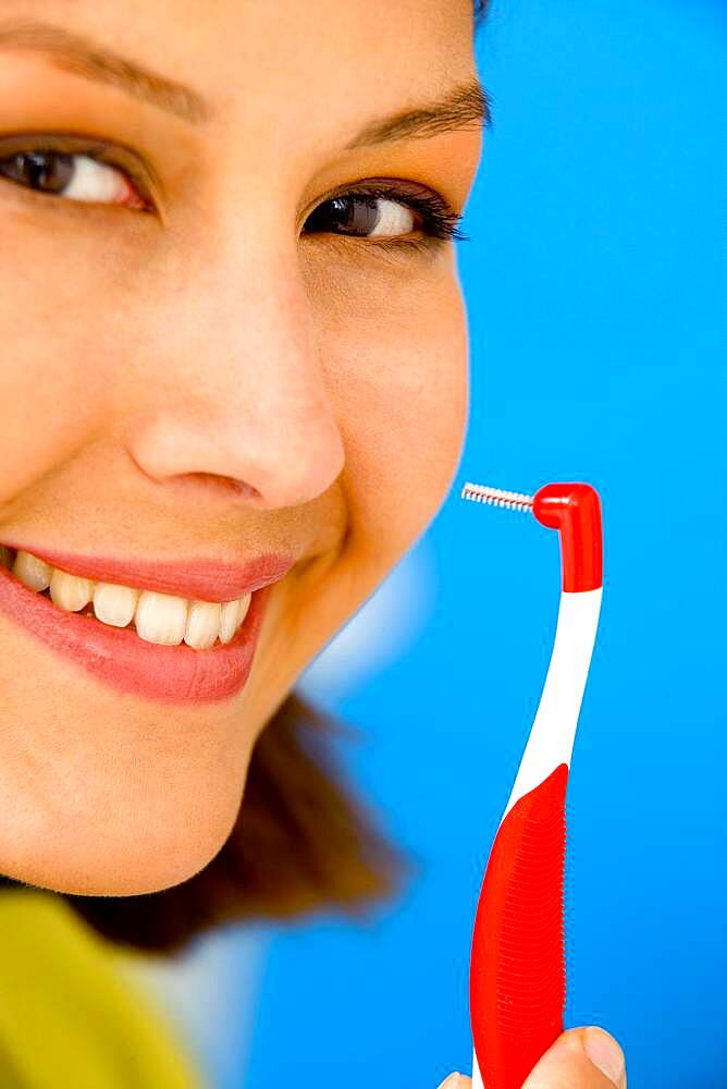 Interdental brush enables to clean the space between two teeth.