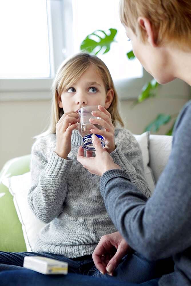 Child taking medication