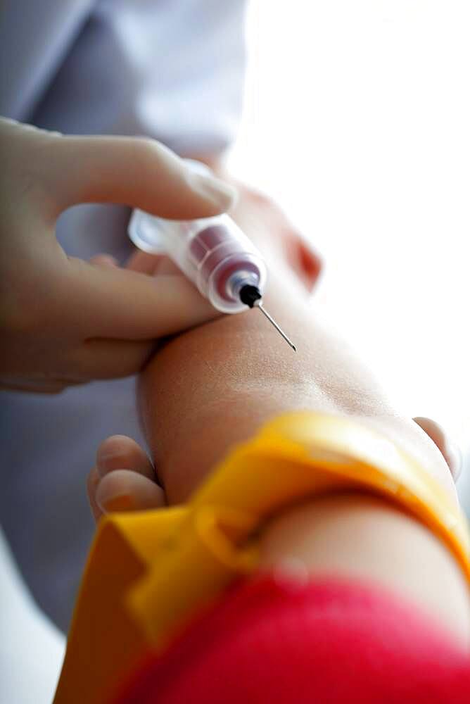 Blood specimen in a woman