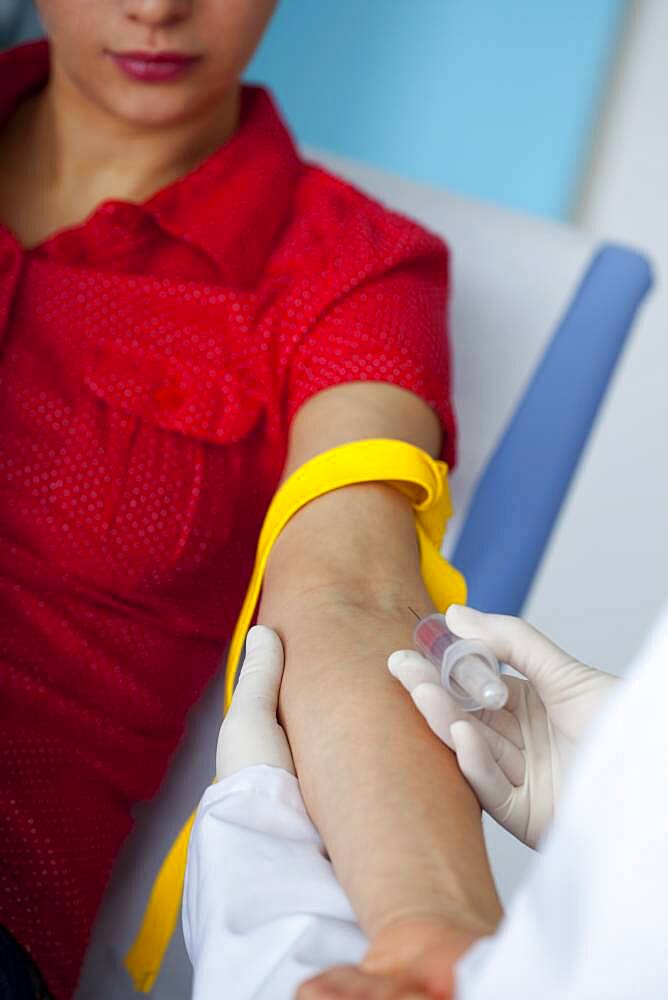 Blood specimen in a woman