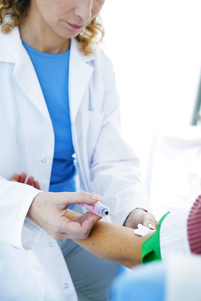 Blood specimen in a woman