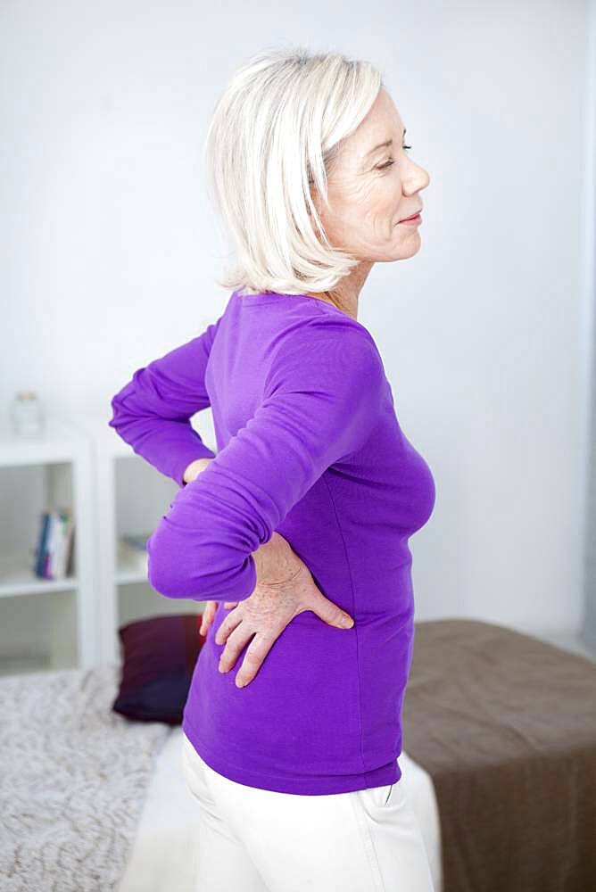 Senior woman with lumbar pain.