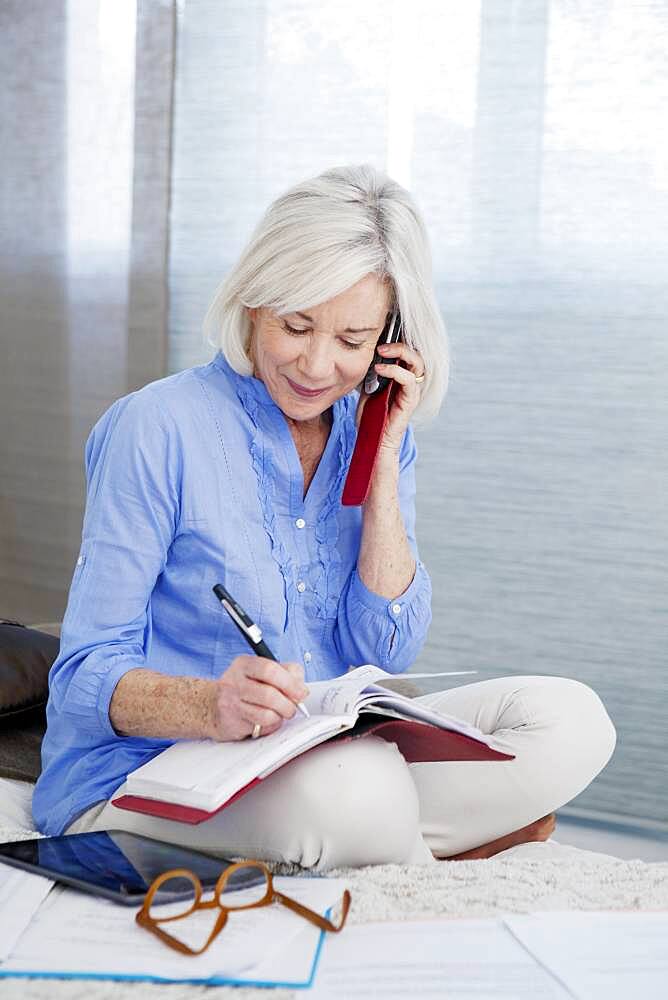 Senior woman on the phone.