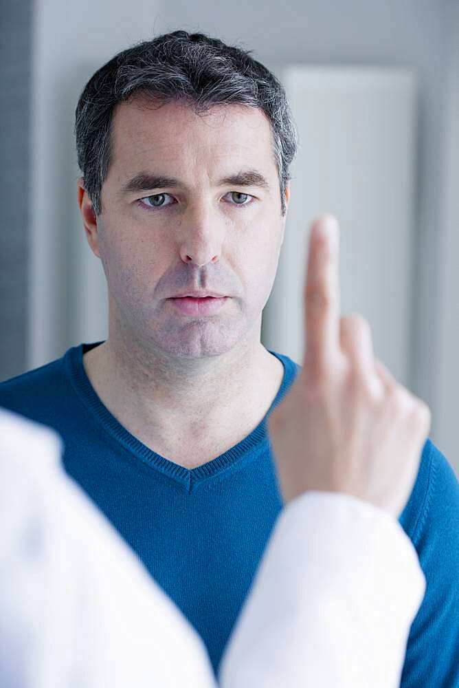 Man during an orthoptic session.