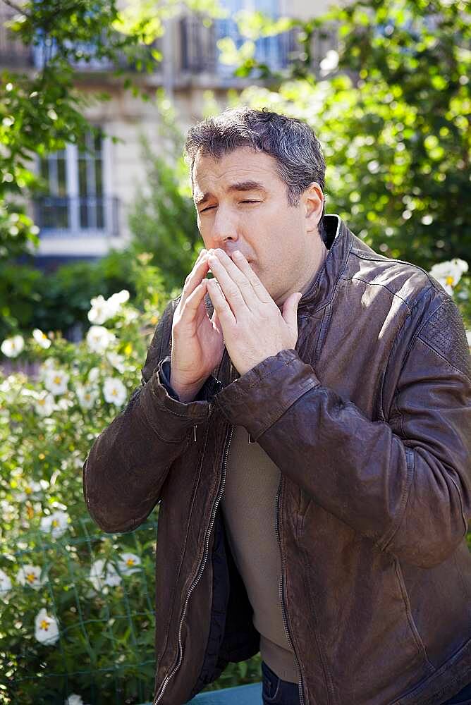 Man sneezing.