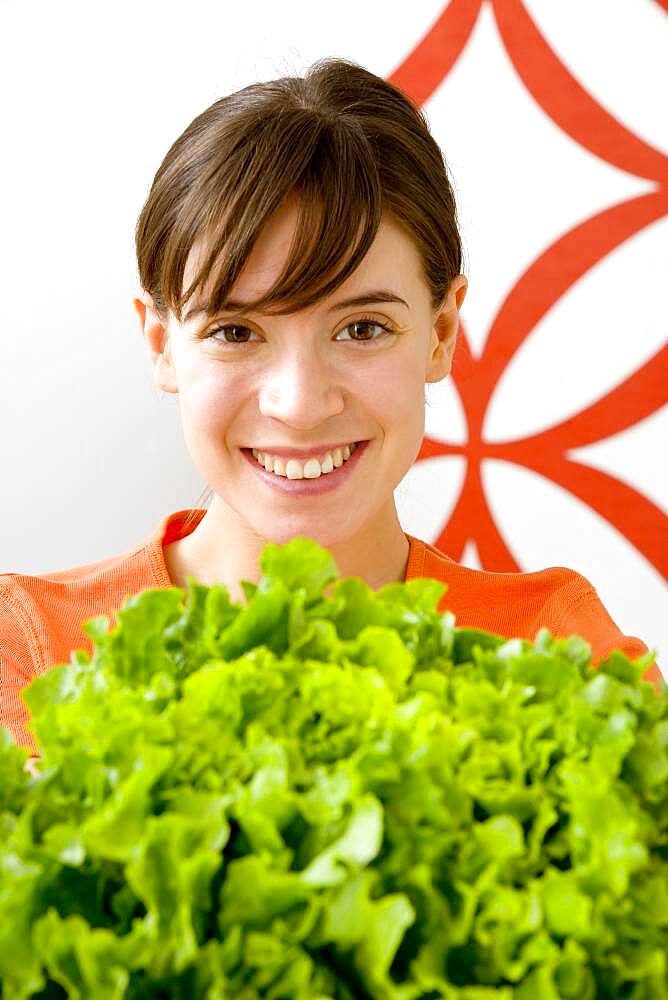 Woman eating raw vegetables