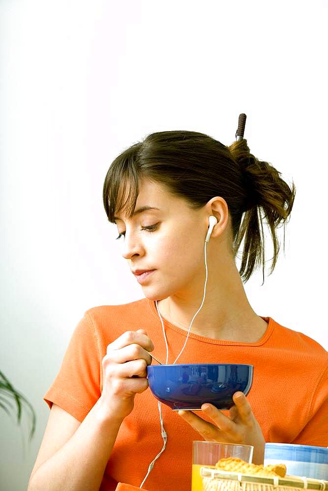 Woman eating breakfast