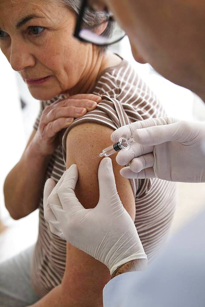 Vaccinating an elderly person