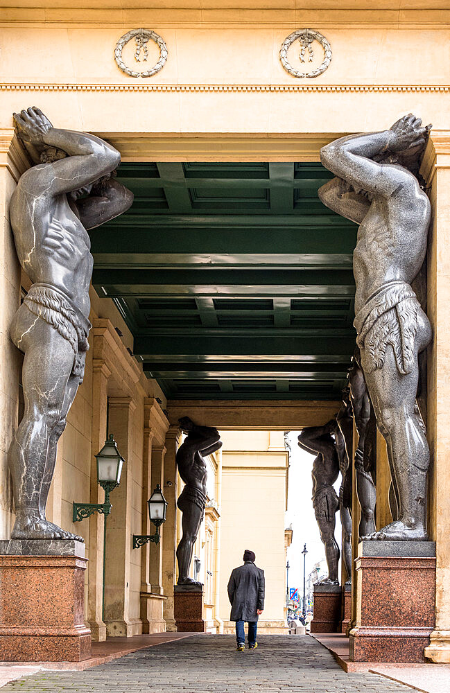 Atlantes, granite giants by sculptor Alexander Terebenev supporting the portico of the New Hermitage, St. Petersburg, Russia, Europe