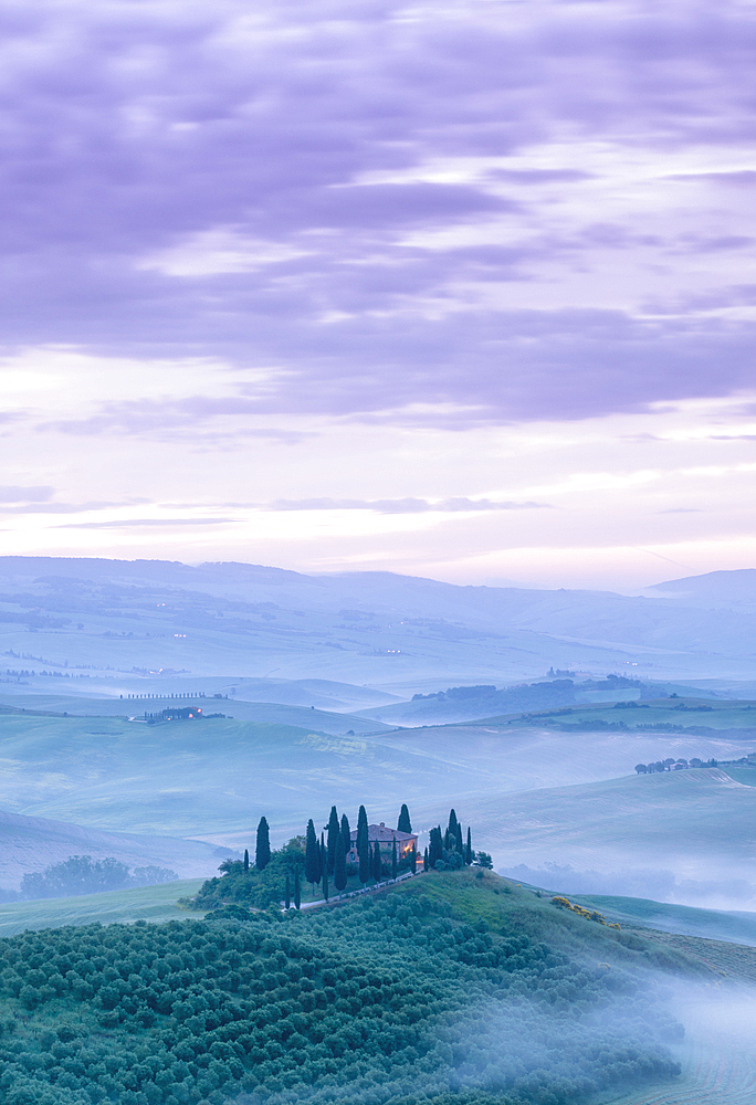 Misty sunrise over Belvedere, Val d'Orcia, UNESCO, Tuscany, Italy