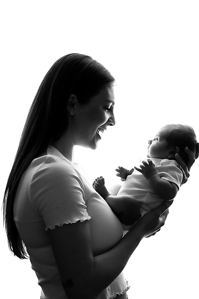 Mother with a baby, studio shot, United Kingdom, Europe