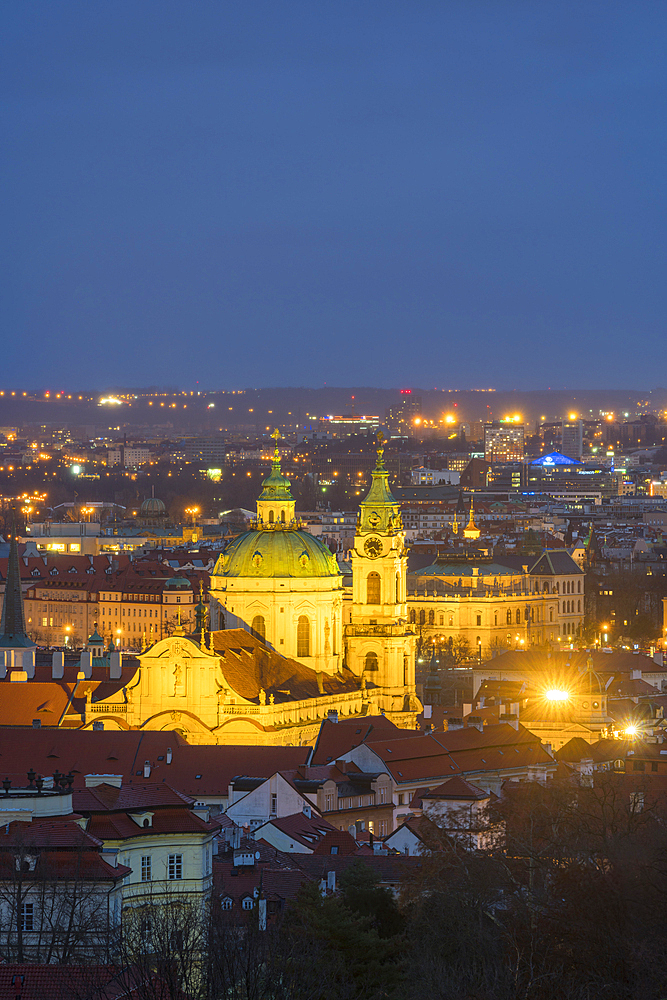 Illuminated St. Nicholas Church at night, Mala Stranar, UNESCO World Heritage Site, Prague, Bohemia, Czech Republic (Czechia), Europe