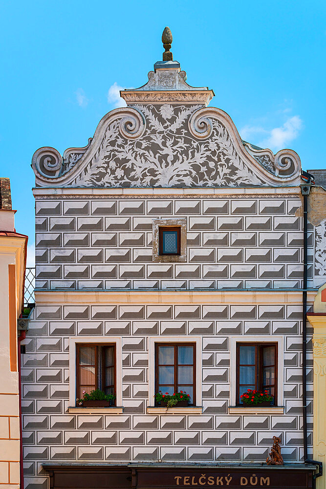 Painted facade of Telcsky dum (Telc House) at Zacharias of Hradec Square, UNESCO, Telc, Vysocina Region, Czech Republic