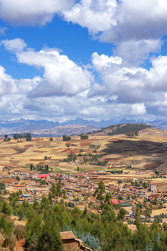 Racchi village near Chinchero with distant views of Andes mountains, Sacred Valley, Peru