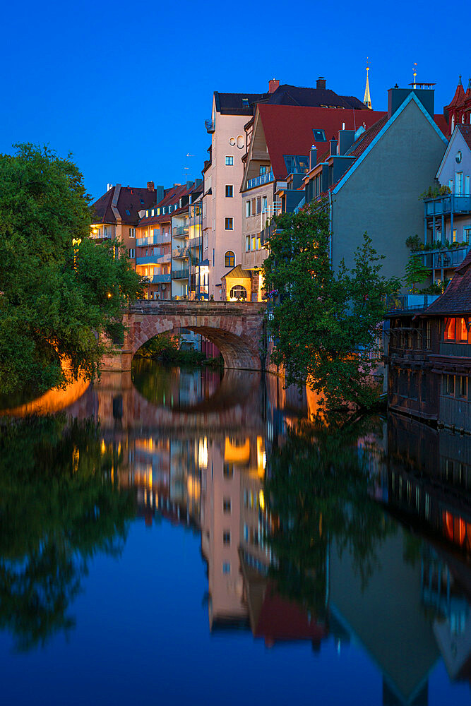 Residential buildings along Pegnitz River seen from Henkersteg bridge, Nuremberg, Bavaria, Germany, Europe