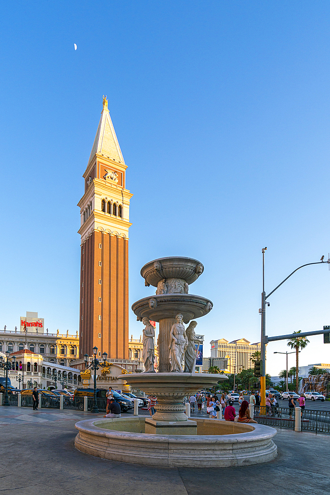 Water fountain and tower at The Venetian Las Vegas Hotel at sunset, Las Vegas Strip, Paradise, Las Vegas Boulevard, Las Vegas, Nevada, United States of America, North America