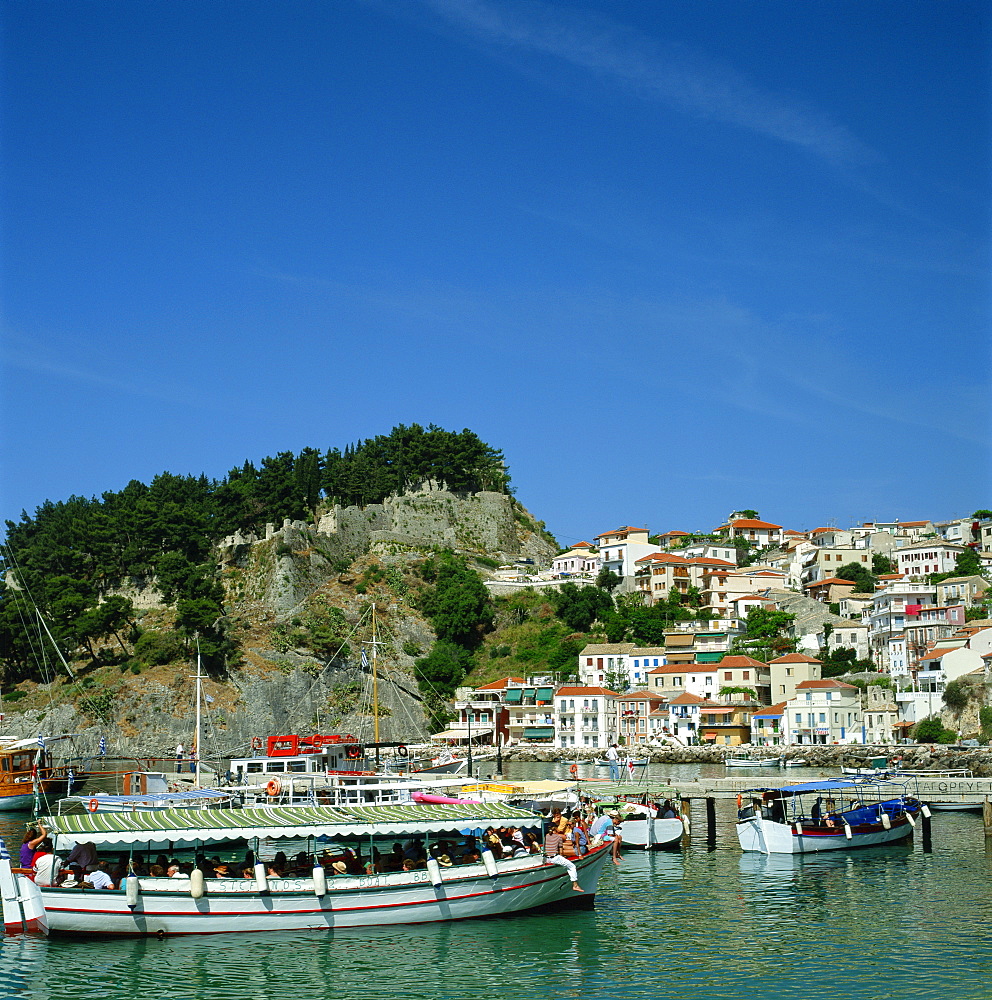 Tourist boats and the town of Parga in the background, Greece, Europe