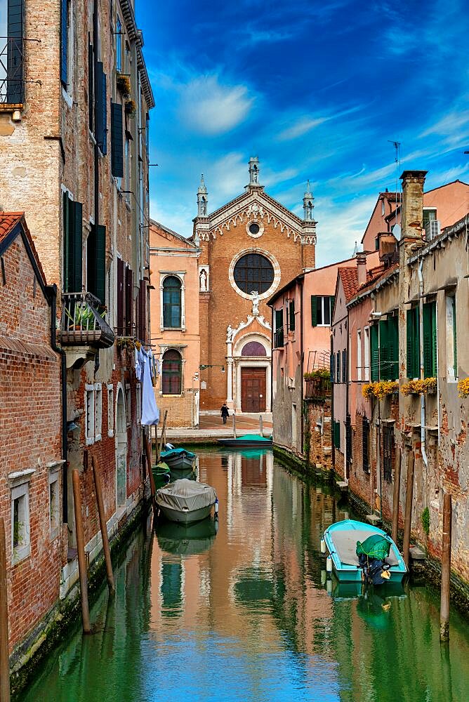 Rio Ca 'Brazzo with its typical Venetian houses. In the background the Church of the Madonna dell'Orto, Venice, Veneto, Italy