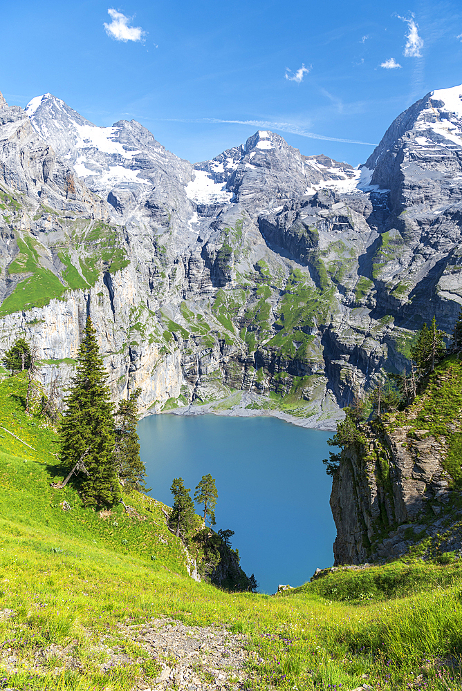 Elevated view of the crystal clear water of Oeschinensee lake, Oeschinensee, Kandersteg, Bern Canton, Switzerland, Europe