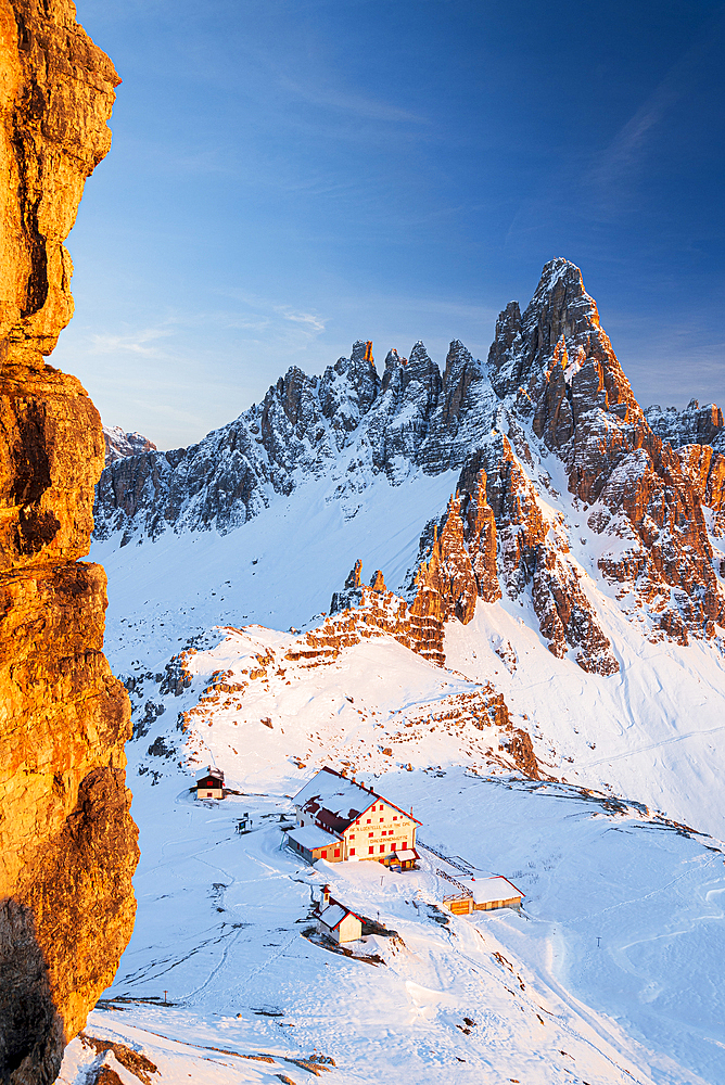 Sunset on Locatelli hut and Paterno mountain seen from Sasso di Sesto, Tre Cime di Lavaredo (Lavaredo peaks), Sesto (Sexten), Dolomites, South Tyrol, Italy, Europe