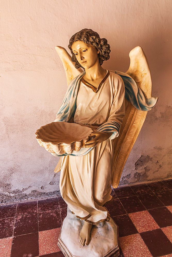 Loreto, Baja California Sur, Mexico. November 17, 2021. Sculpture of an angel in the historic Loreto Mission.