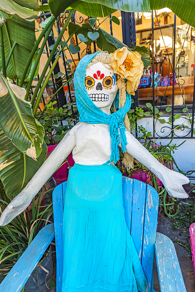 La Paz, Baja California Sur, Mexico. November 18, 2021. Folk art sculpture of a skeleton with flower eyes.