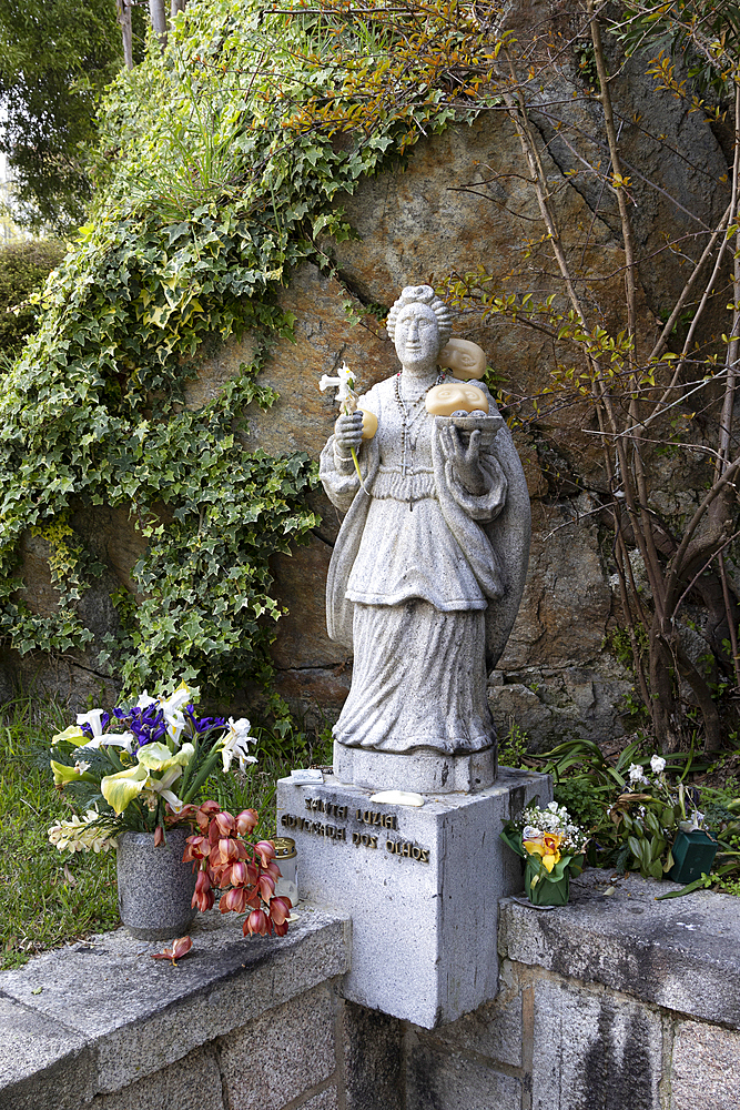 Europe, Portugal, Viana do Castelo. Statue of Saint Lucy on the grounds of the Sanctuary of the Sacred Heart on the Monte de Luzia, Mount of Saint Lucy.