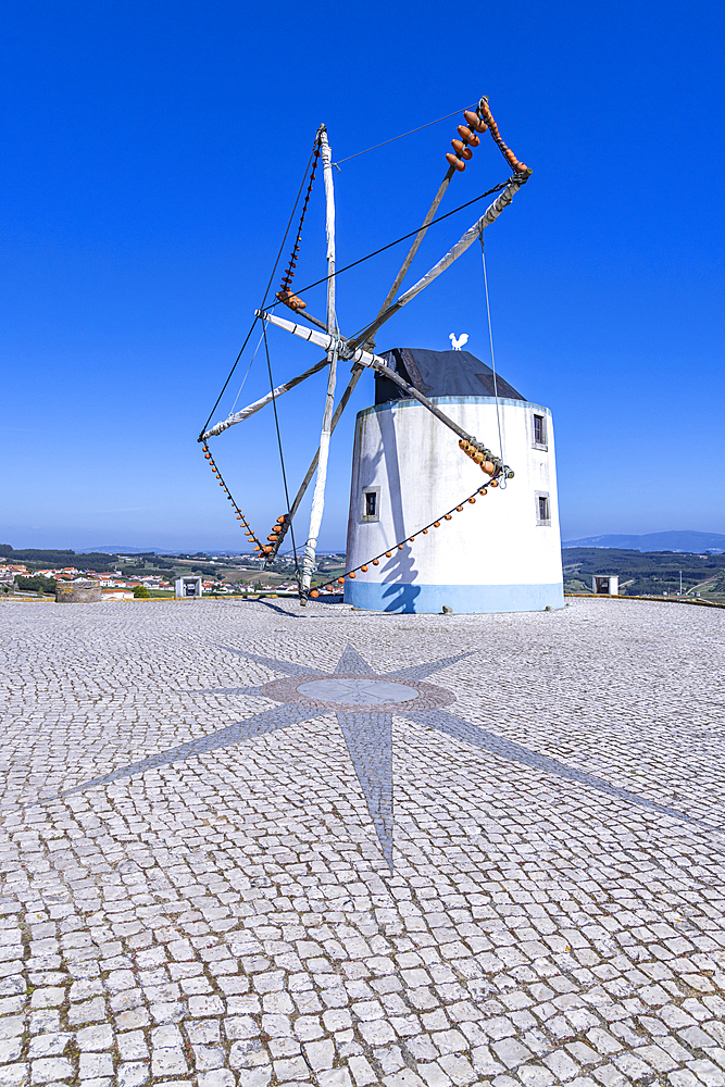 Europe, Portugal, Moita dos Ferreiros.  Moinhos de Ventos. windmills Traditional Clay pots, jugs, used to catch the winds.