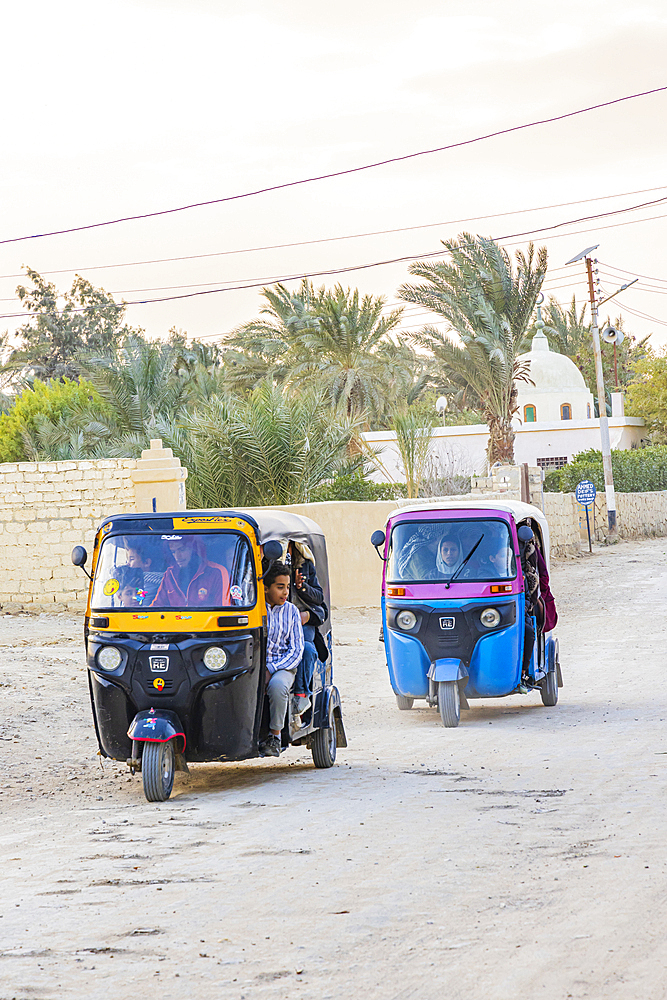 Faiyum, Egypt. February 19, 2022. Tuk tuk taxis in the village of Faiyum.