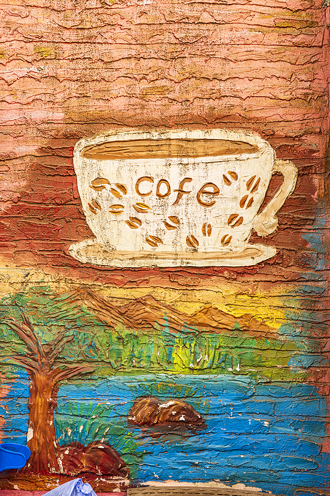 Thebes, Luxor, Egypt. February 24, 2022. Mural of a coffee cup on a cafe in Luxor.