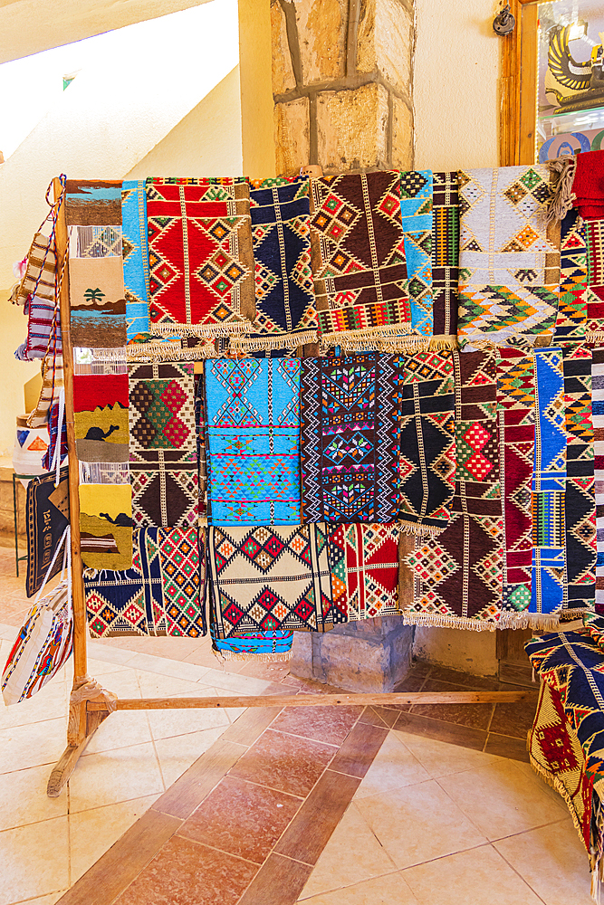 Abu Simbel, Aswan, Egypt. February 23, 2022. Small woven rug souvenirs at a tourist shop in Abu Simbel.