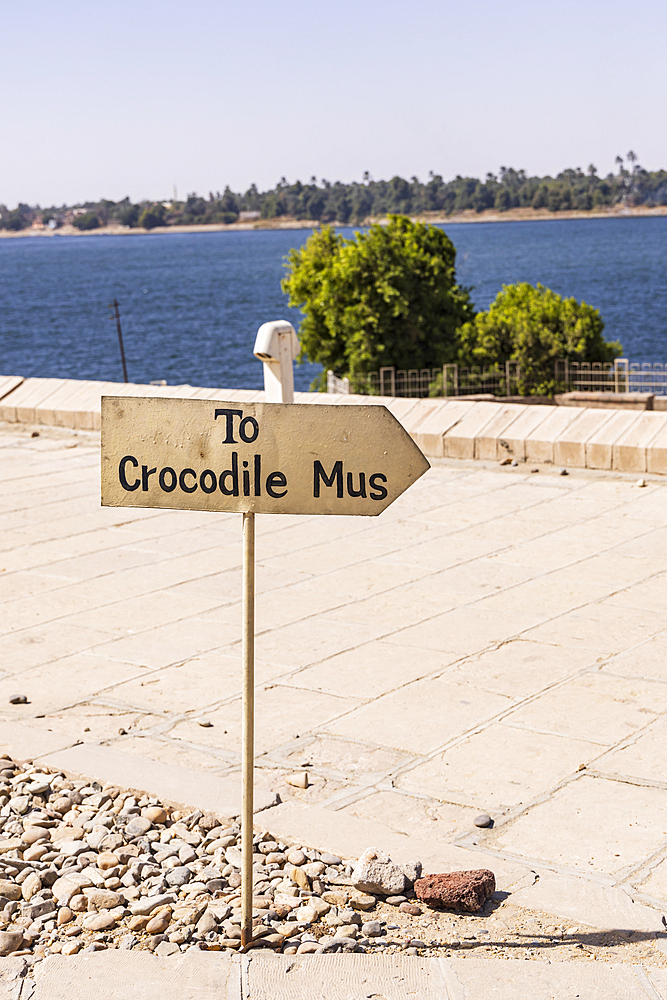 Kom Ombo, Aswan, Egypt. Sign pointed to the Crocodile Museum along the Nile river at Kom Ombo.