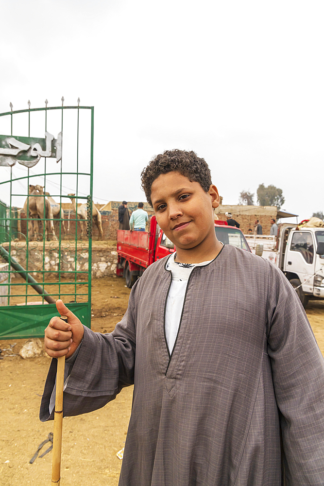 Birqash, Cairo, Egypt. February 18, 2022. A young man camel handler at a tea shop at the Birqash Camel Market outside Cairo.