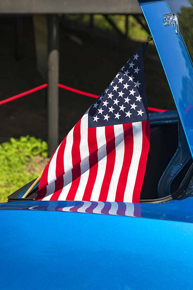 Marble Falls, Texas, USA. April 10, 2021. US flag on at a car show in Texas.