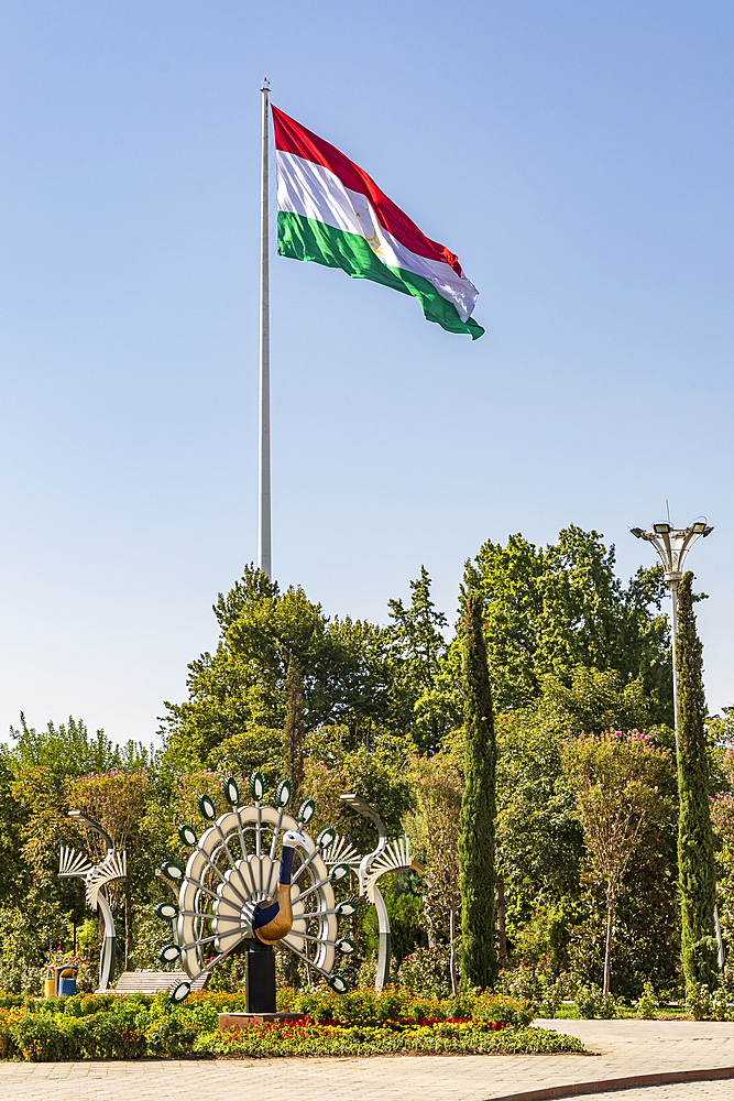 Dushanbe, Tajikistan. August 11, 2021. Tajik flag flying in Rudaki Park. Editorial Use Only