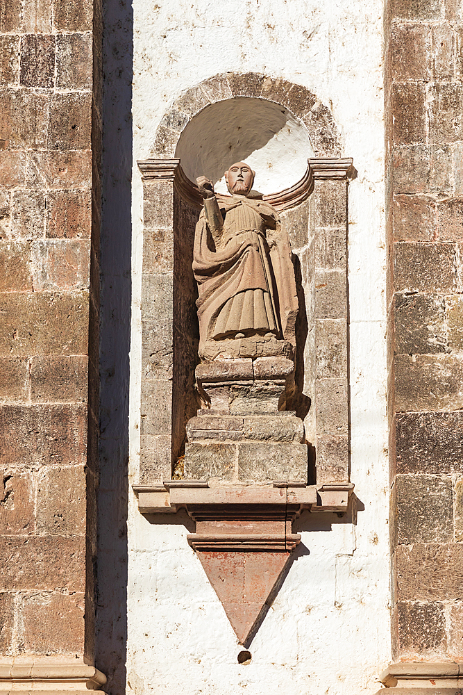 San Ignacio, Mulege, Baja California Sur, Mexico. Sculpture of a priest on the San Ignacio Mission in Baja.