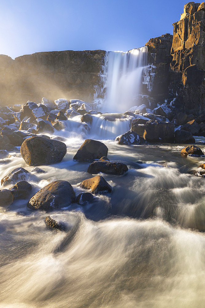 Oxararfoss waterfall at sunset in spring, Sudurland, Iceland, Polar Regions