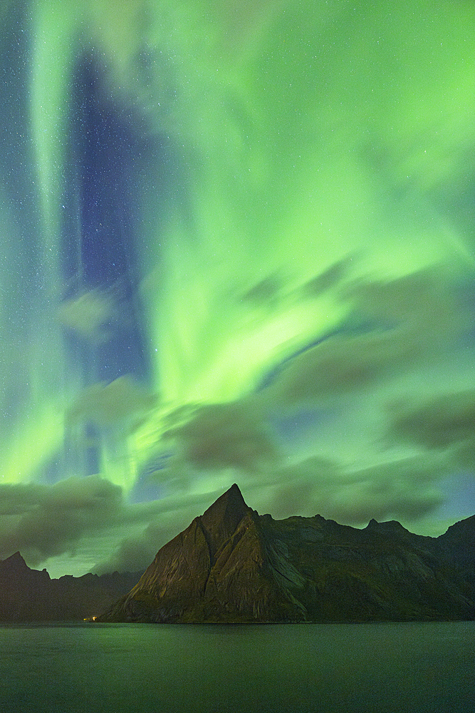 Northern Lights (Aurora Borealis) fill the sky over Reine Bay during an autumn night, Reine, Moskenesoya, Lofoten Islands, Nordland, Norway, Scandinavia, Europe