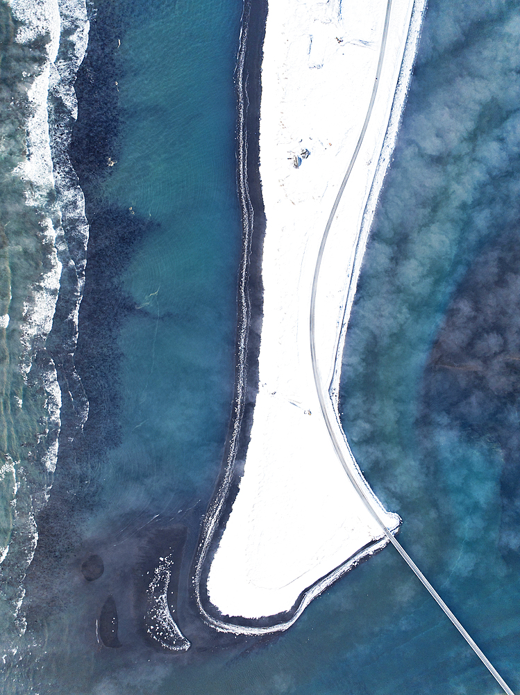 Aerial view by drone of the coastal road near to Selfoss during a cold winter day, Selfoss, Iceland, Polar Regions