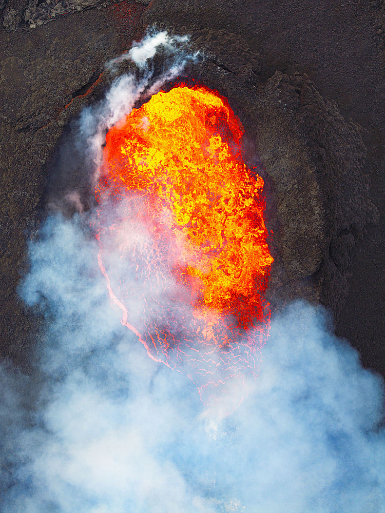 Vertical aerial shot taken by drone of the volcano Sundhnukasgigar, during the eruption of summer 2024, Iceland, Polar Regions