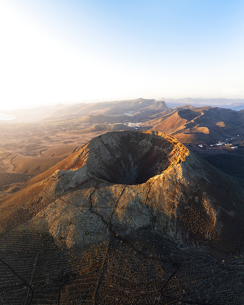 Aerial view of the crater of Volcan de la Corona during sunrise, Haria, Las Palmas, Lanzarote, Canary Islands, Macaronesia, Spain, Western Europe