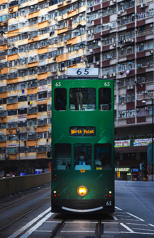 Green tram and Nam Tin building, North Point. Hong Kong, China, Asia