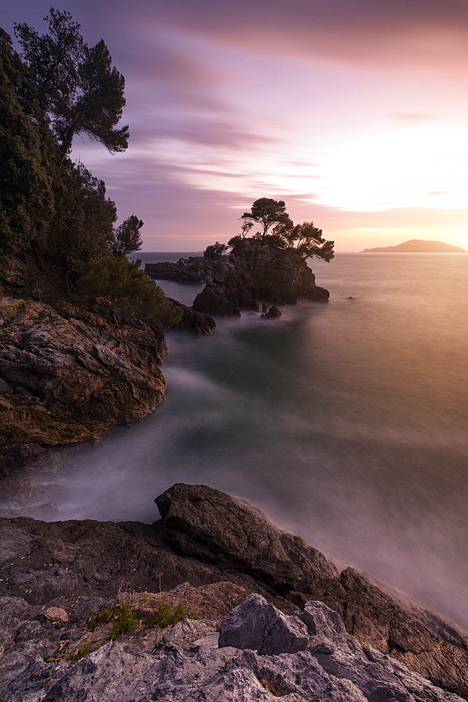 Long exposure to capture the sunset light along the Lerici coast, on a winter day, Lerici, La Spezia province, Liguria district, Italy, Europe