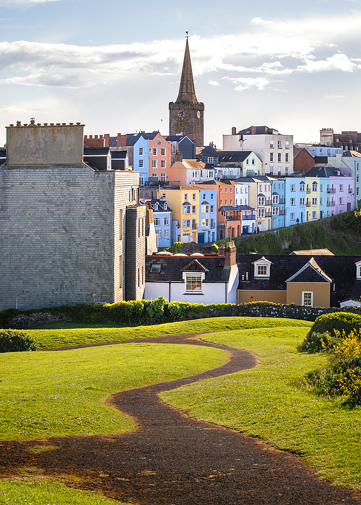 Colorful rooftops and church spire in the seaside village of Tenby on the Pembrokeshire Coast, Wales, United Kingdom, Europe