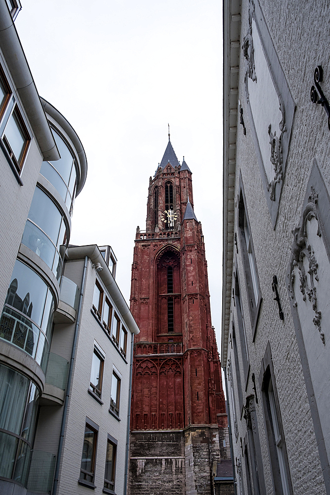 Maastricht, Netherlands – View of Sint-Janskerk, a Gothic church known for its striking red tower. Located on Vrijthof square beside the Basilica of Saint Servatius, it is a symbol of Maastricht’s heritage.