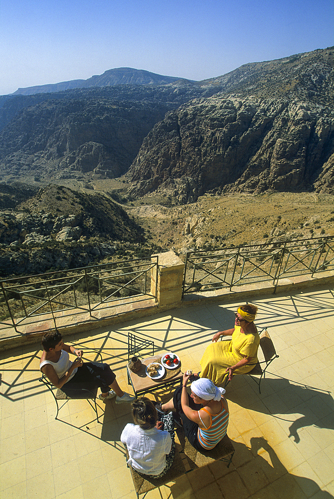 Women on a terrace above the Dana Valley, Jordan, Middle East