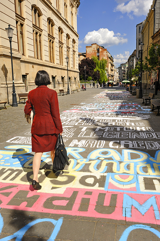 painted writing on the floor of Franceza street along the building of the National Museum of Romanian History,Lipscani district, Old City,Bucharest,Romania,Southeastern and Central Europe